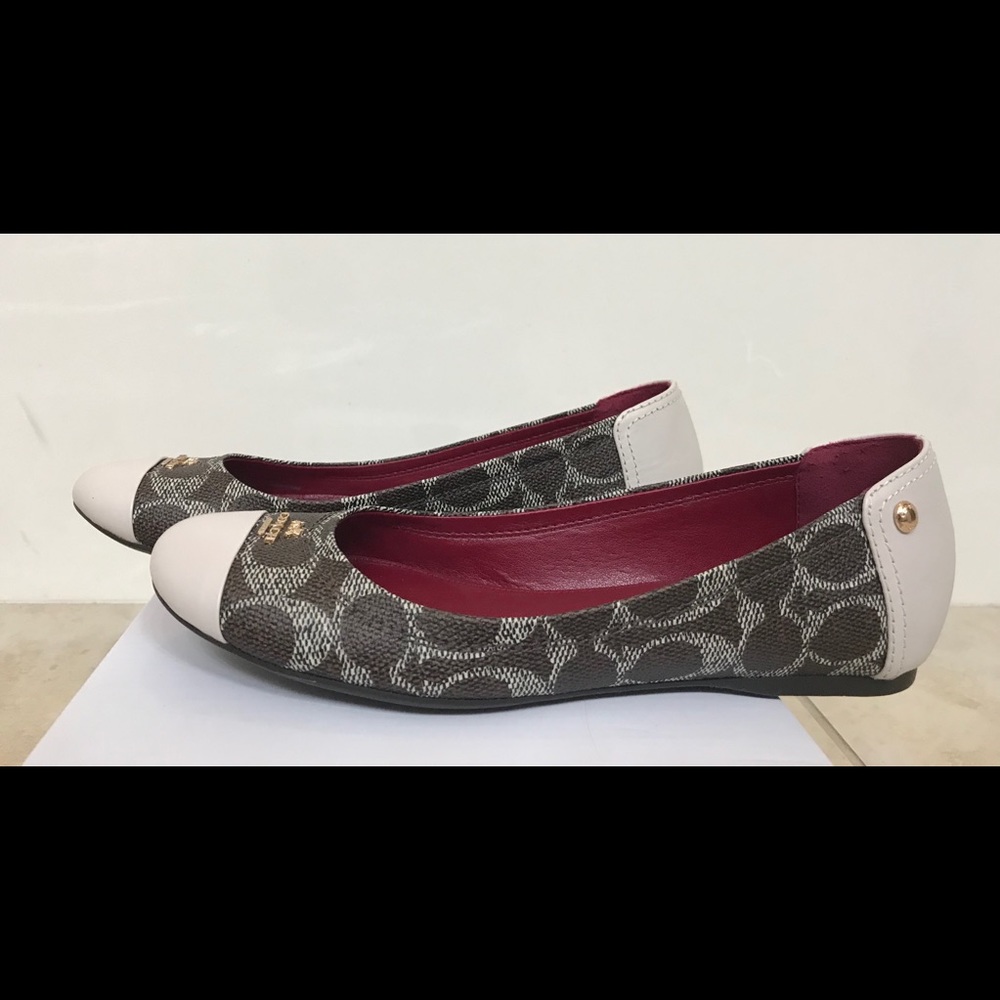 Chelsea cap toe Coach flat shoes .